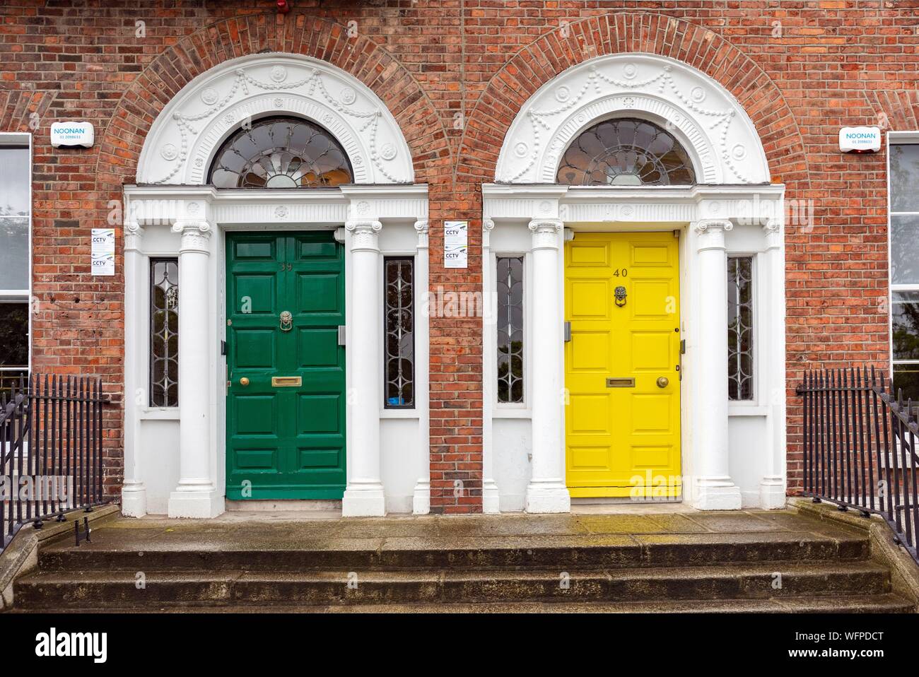 Ireland, Dublin, Merrion Square, the famous colorful doors and their brass knobs and handles typically from Georgian art Stock Photo