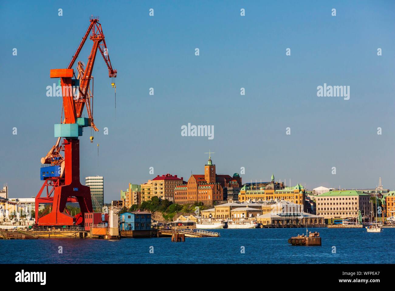 Sweden, Vastra Gotaland, Goteborg (Gothenburg), the former shipyards of Lundbyvassen, buildings of the company ASECO on Packhusplatsen facing the harbor and Kvarnberget and his clock Stock Photo