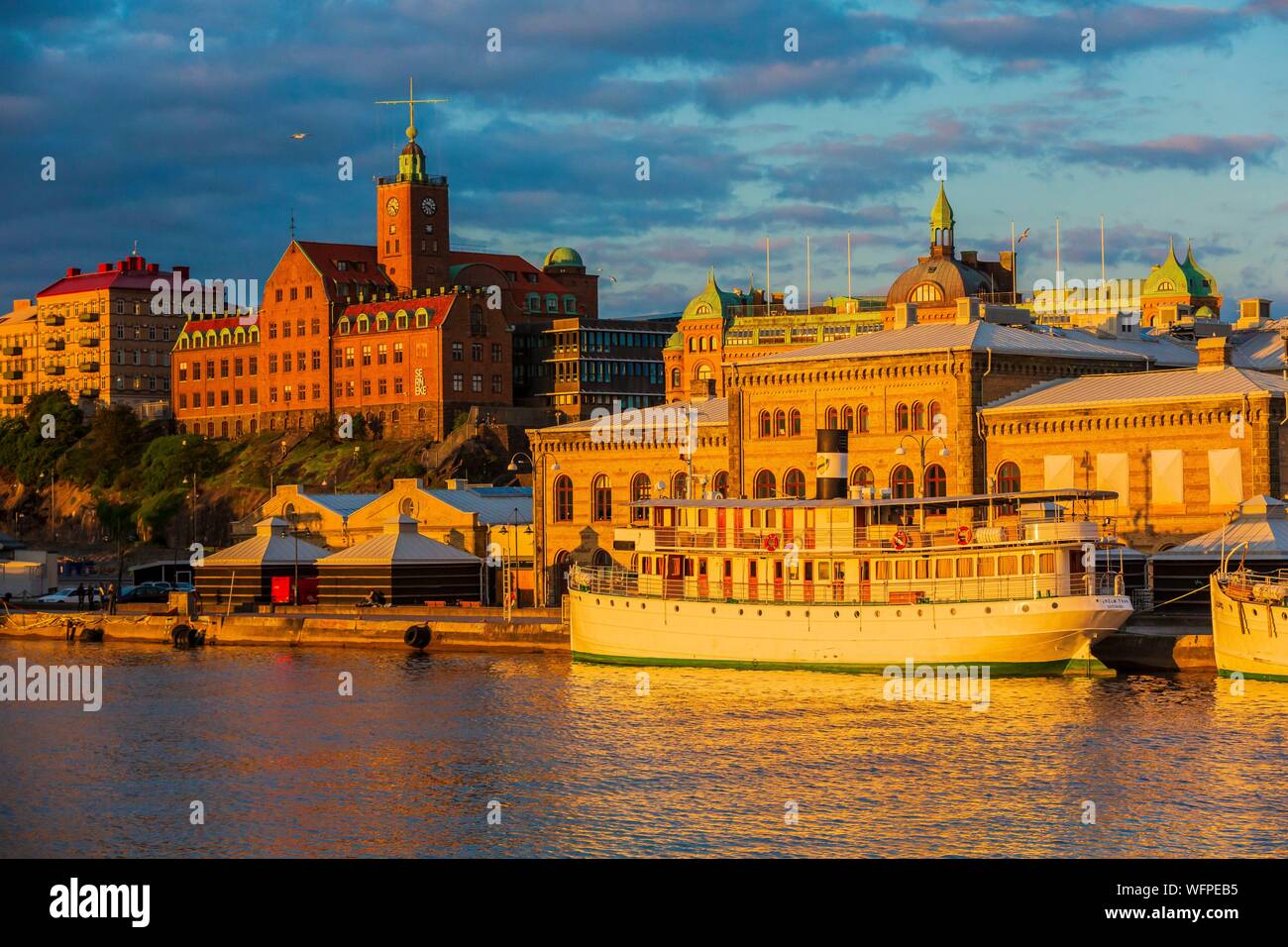 Sweden, Vastra Gotaland, Goteborg (Gothenburg), the roofs of the buildings of the company ASECO on Packhusplatsen and Kvarnberget and his clock Stock Photo