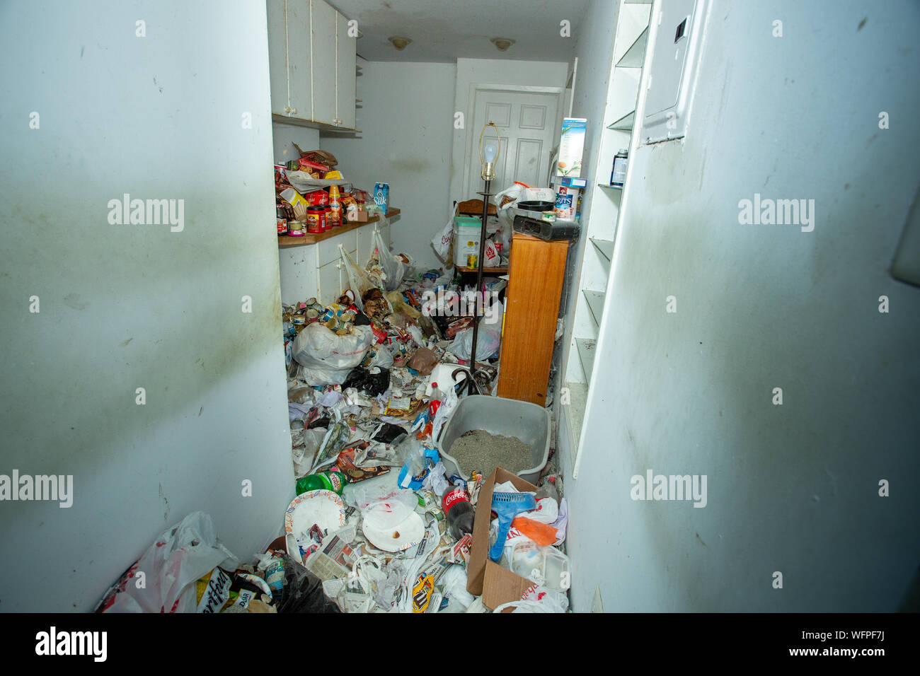 Kitchen in the apartment of a hoarder with mental illness Stock Photo