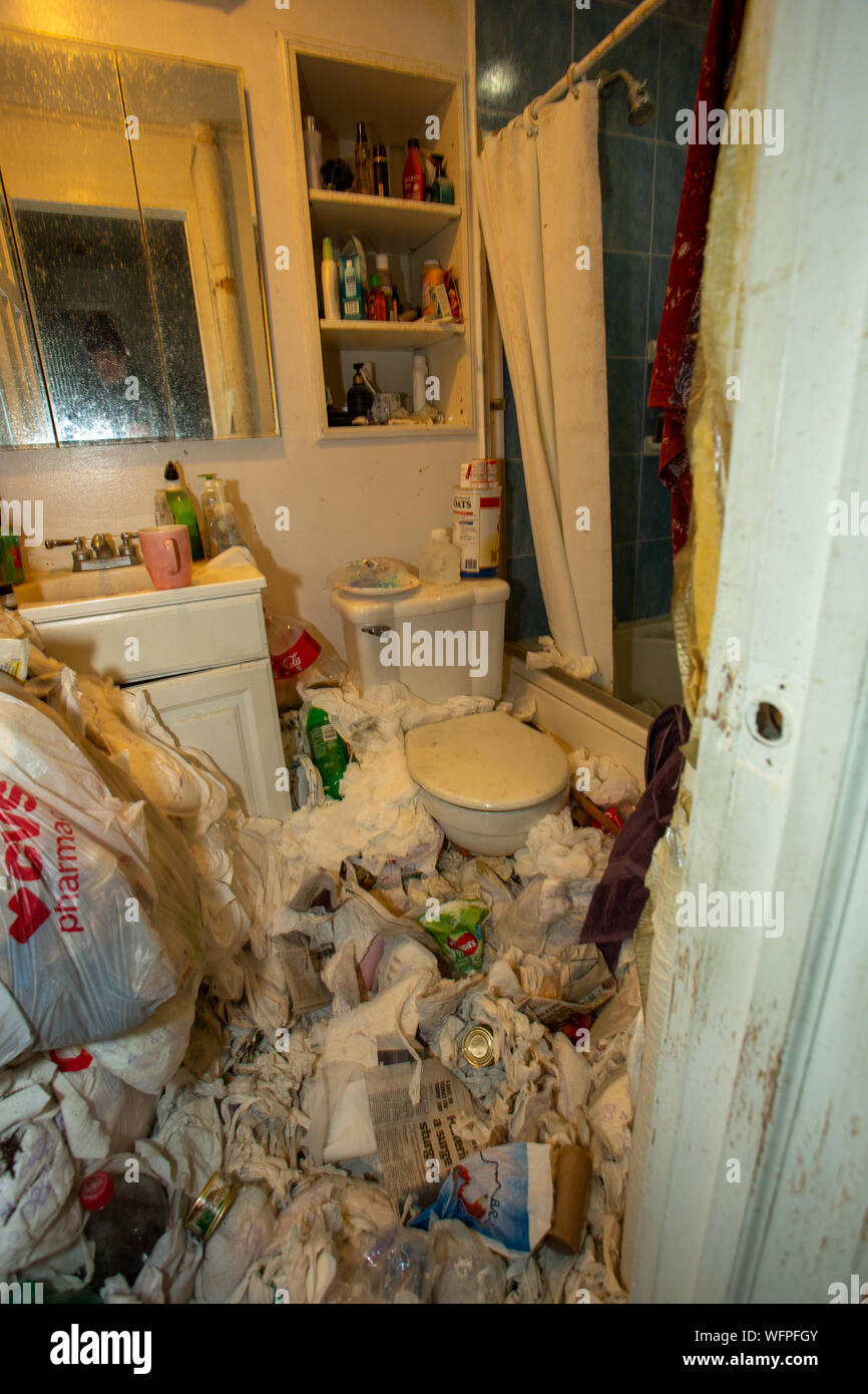 Bathroom in apartment of a hoarder with mental illness Stock Photo