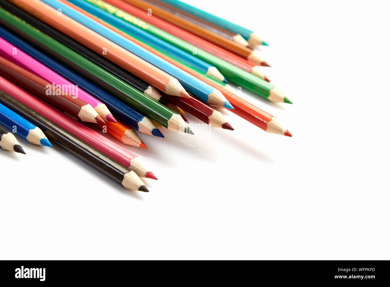 Colored Pencils Over White Background Stock Photo