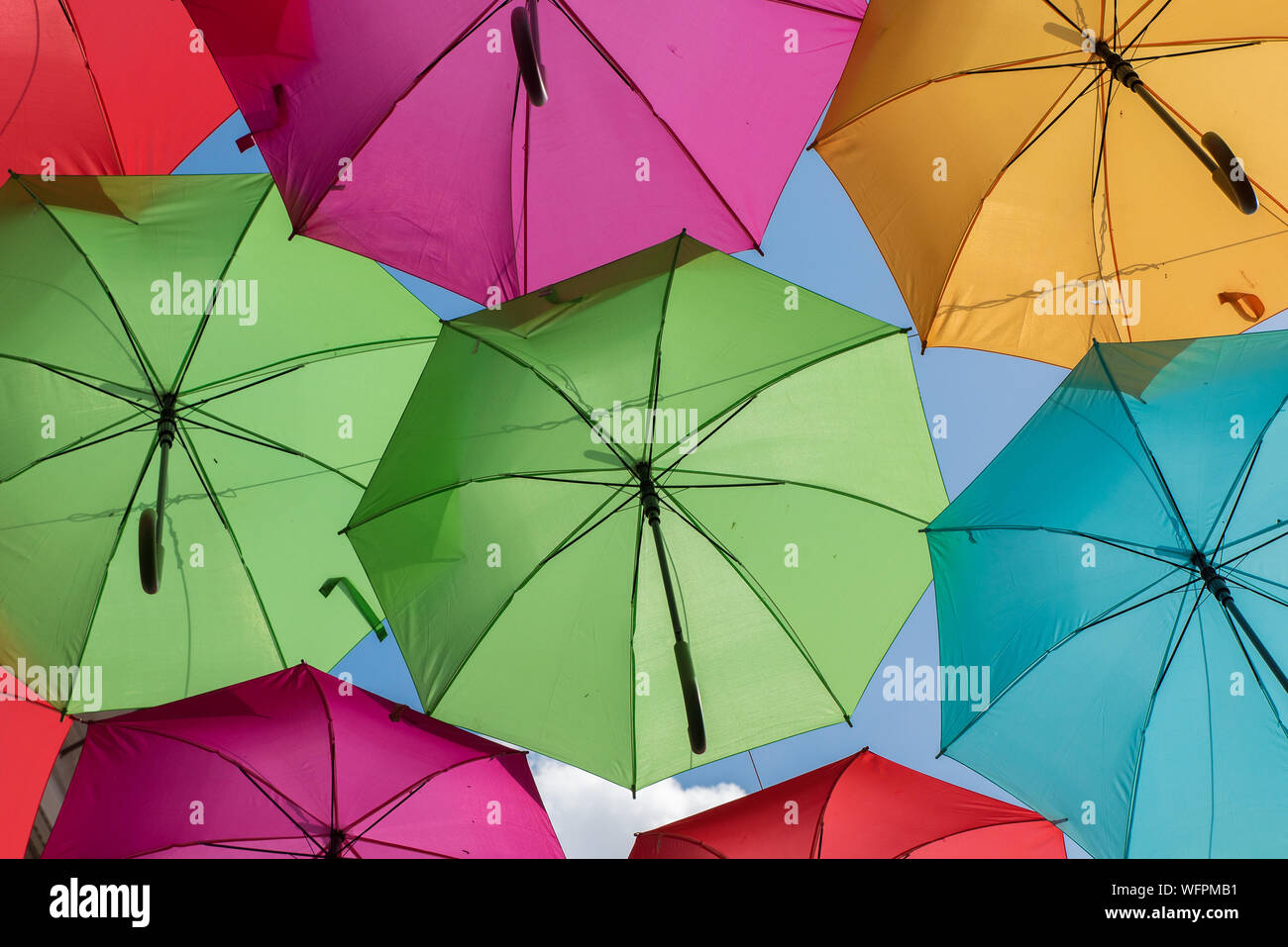 Street with colorful umbrellas in Agueda, Aveiro Portugal Stock Photo