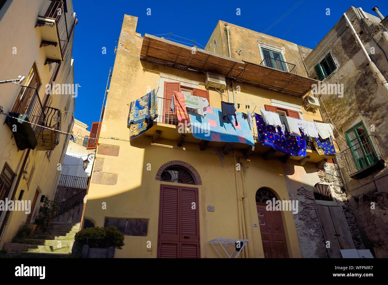 Italy, Sicily, Aeolian Islands, listed as World Heritage by UNESCO, Lipari Island, Lipari, laundry drying on the balcony of a house in the old town Stock Photo