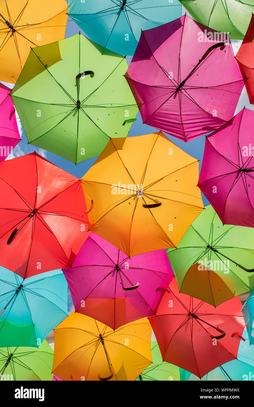 Street with colorful umbrellas in Agueda, Aveiro Portugal Stock Photo
