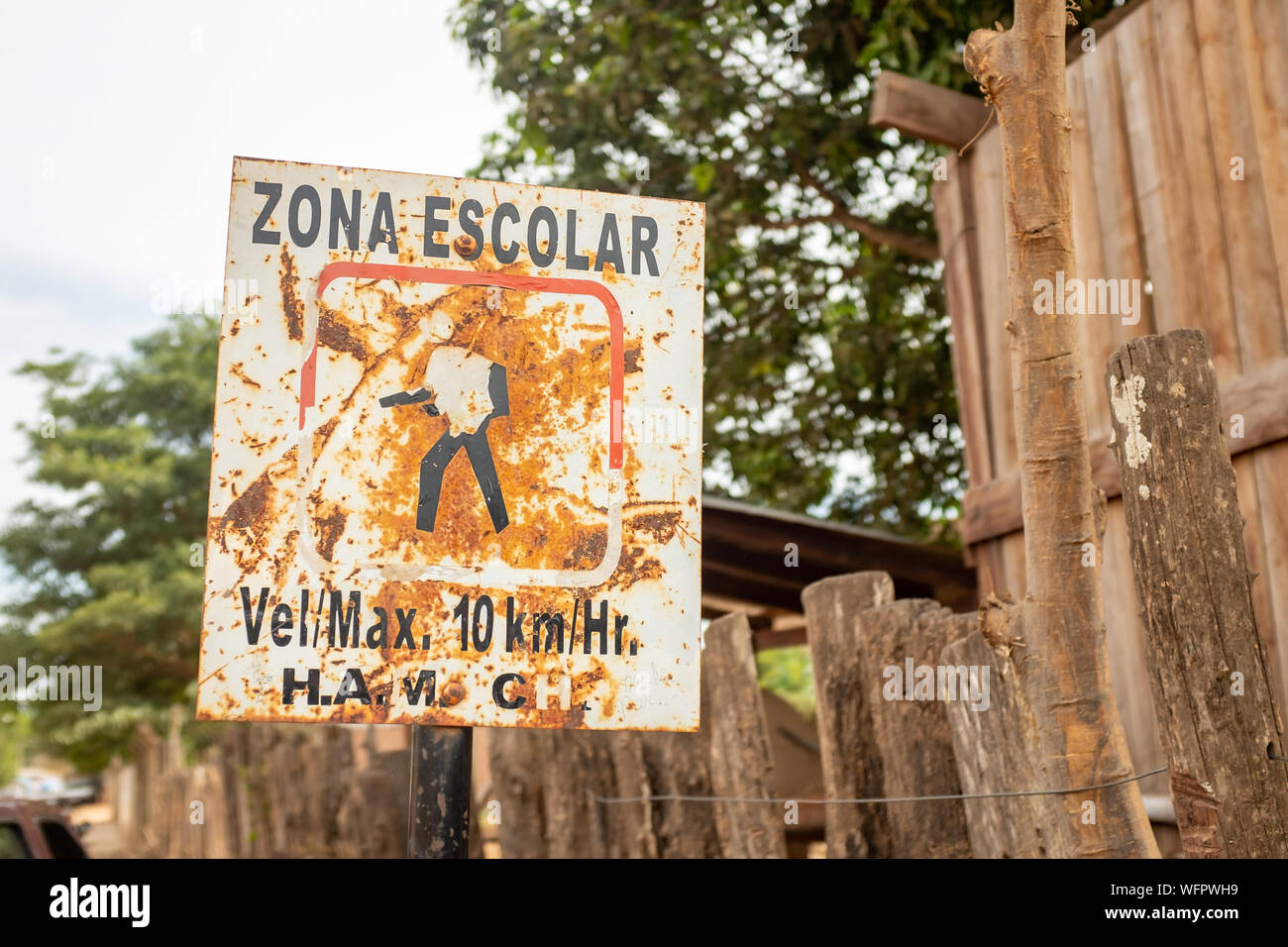 Rusty Sign with School Zone Reference Stock Photo