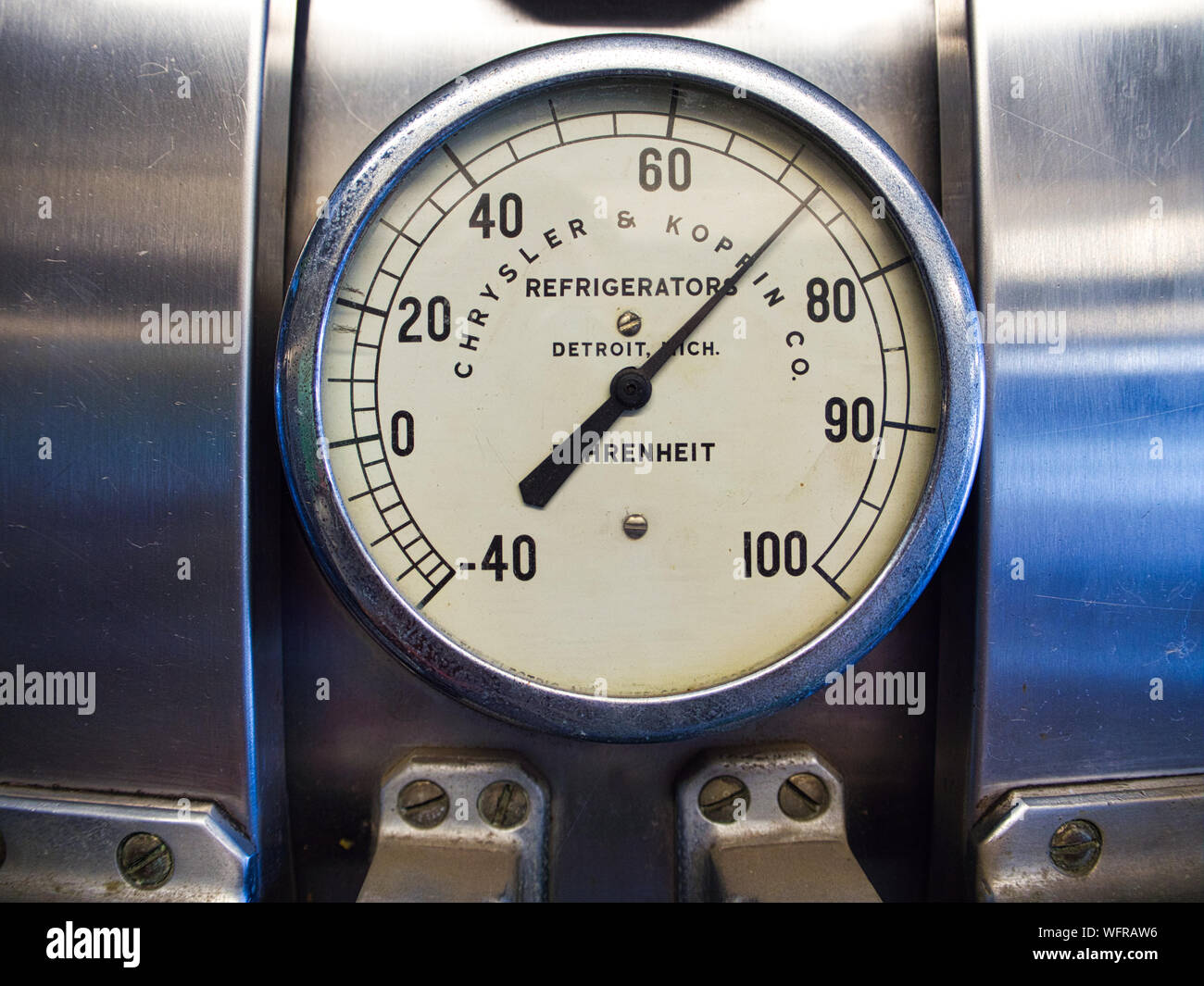Chrystler & Koppin Gauge on a refrigerator located on a cargo ship Stock Photo