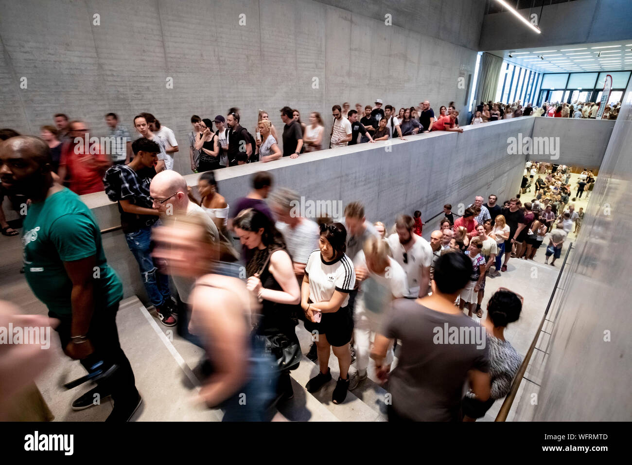 Berlin, Germany. 31st Aug, 2019. Visitors queue up for the Long Night of Museums in the James Simon Gallery. 75 museums open their doors until 2 a.m. at night. (Shooting with long exposure) Credit: Christoph Soeder/dpa/Alamy Live News Stock Photo