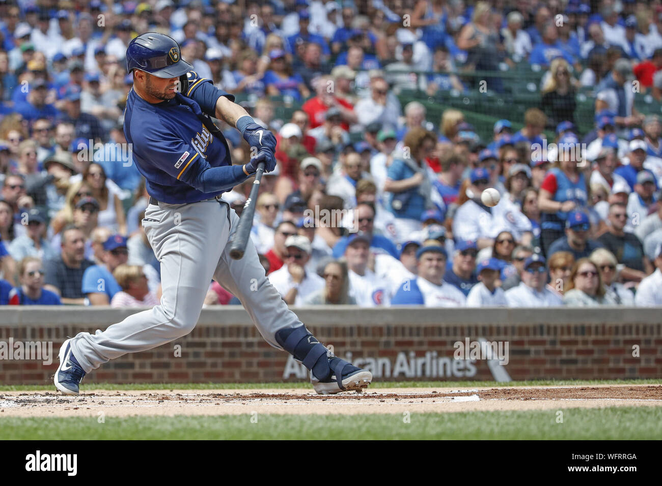 Chicago, USA. 31st Aug, 2019. Milwaukee Brewers catcher Manny Pina hits two-run single against the Chicago Cubs in the first inning at Wrigley Field on Saturday, August 31, 2019 in Chicago. Credit: UPI/Alamy Live News Stock Photo