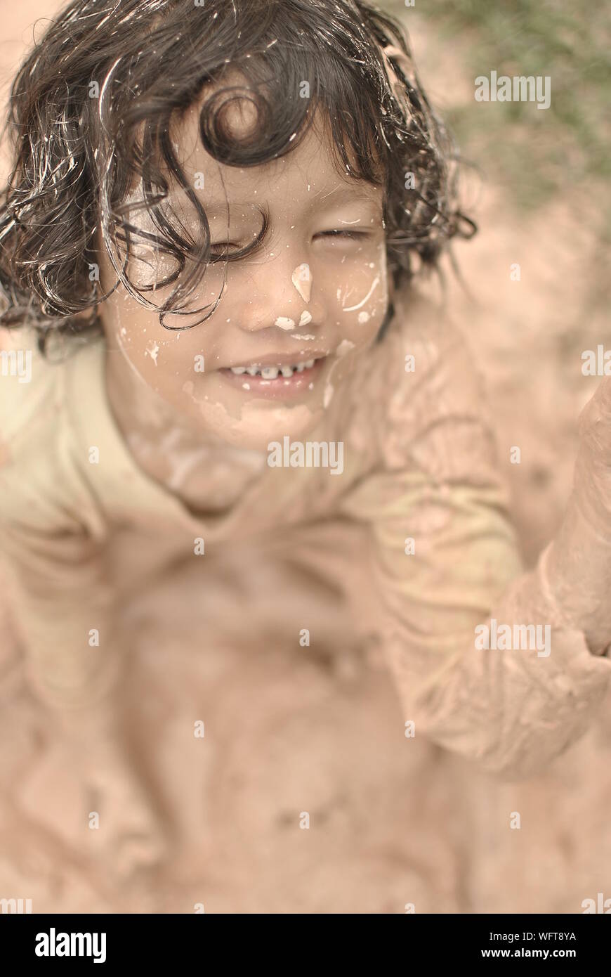 Girl covered in mud hi-res stock photography and images - Alamy