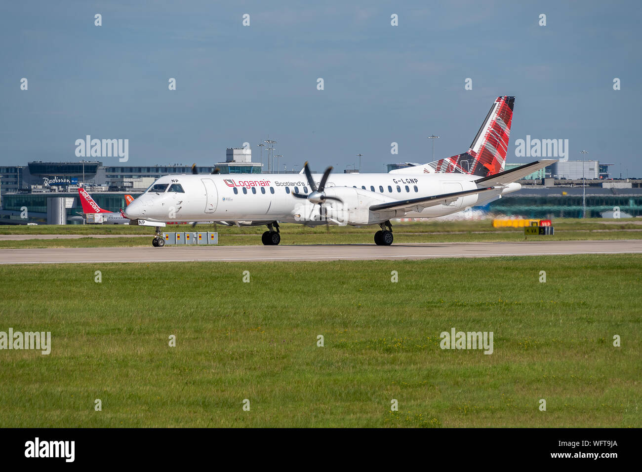 MANCHESTER, UNITED KINGDOM - AUGUST 24, 2019: Loganair Saab 2000 aircraft ready for takeoff Stock Photo