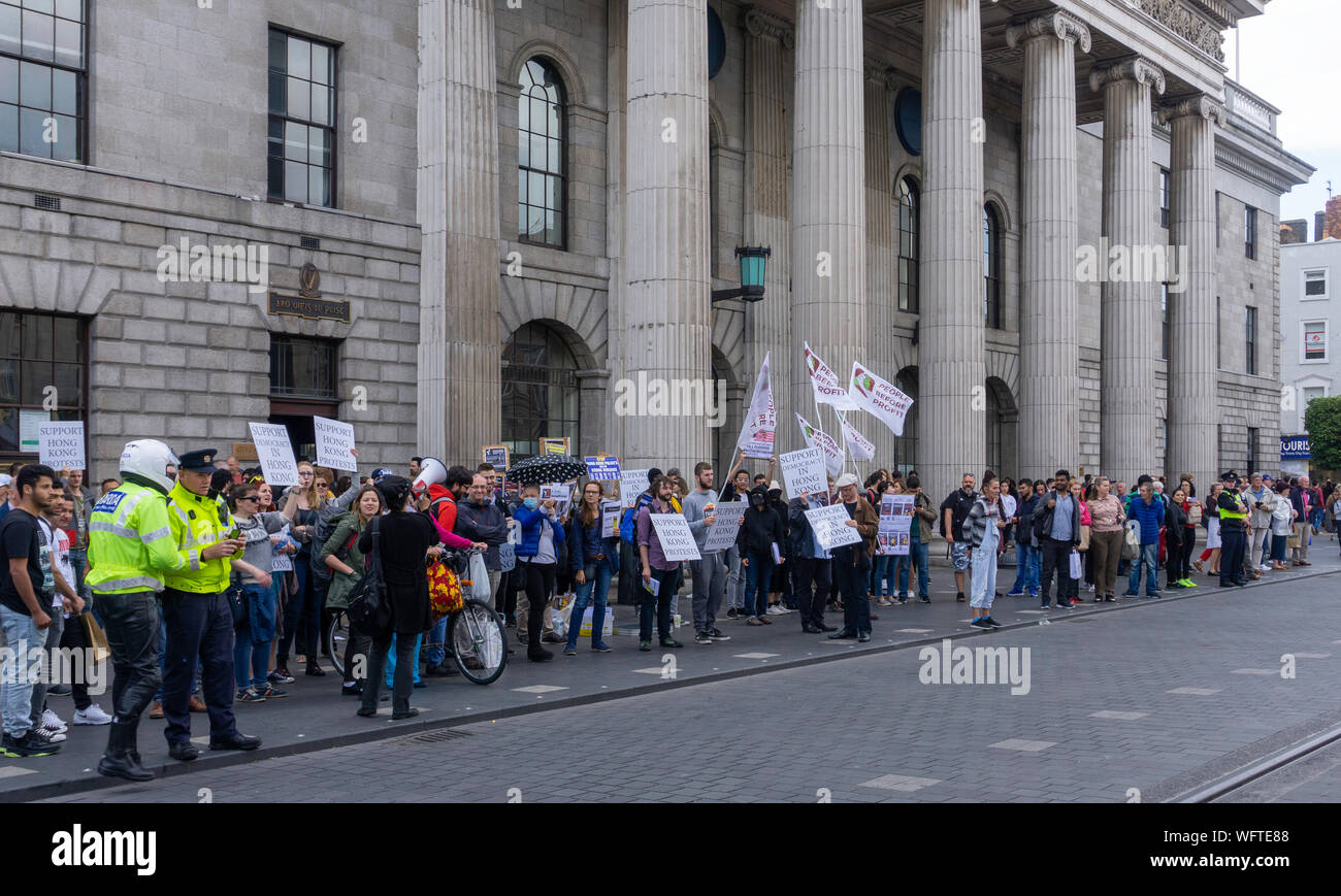 Protesters gather outside the General Post Office in Dublin Ireland in support of the pro democracy movement in Hong Kong. Stock Photo