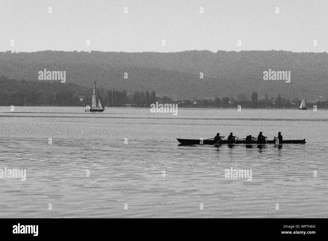 Men in rowing boat Black and White Stock Photos & Images - Alamy