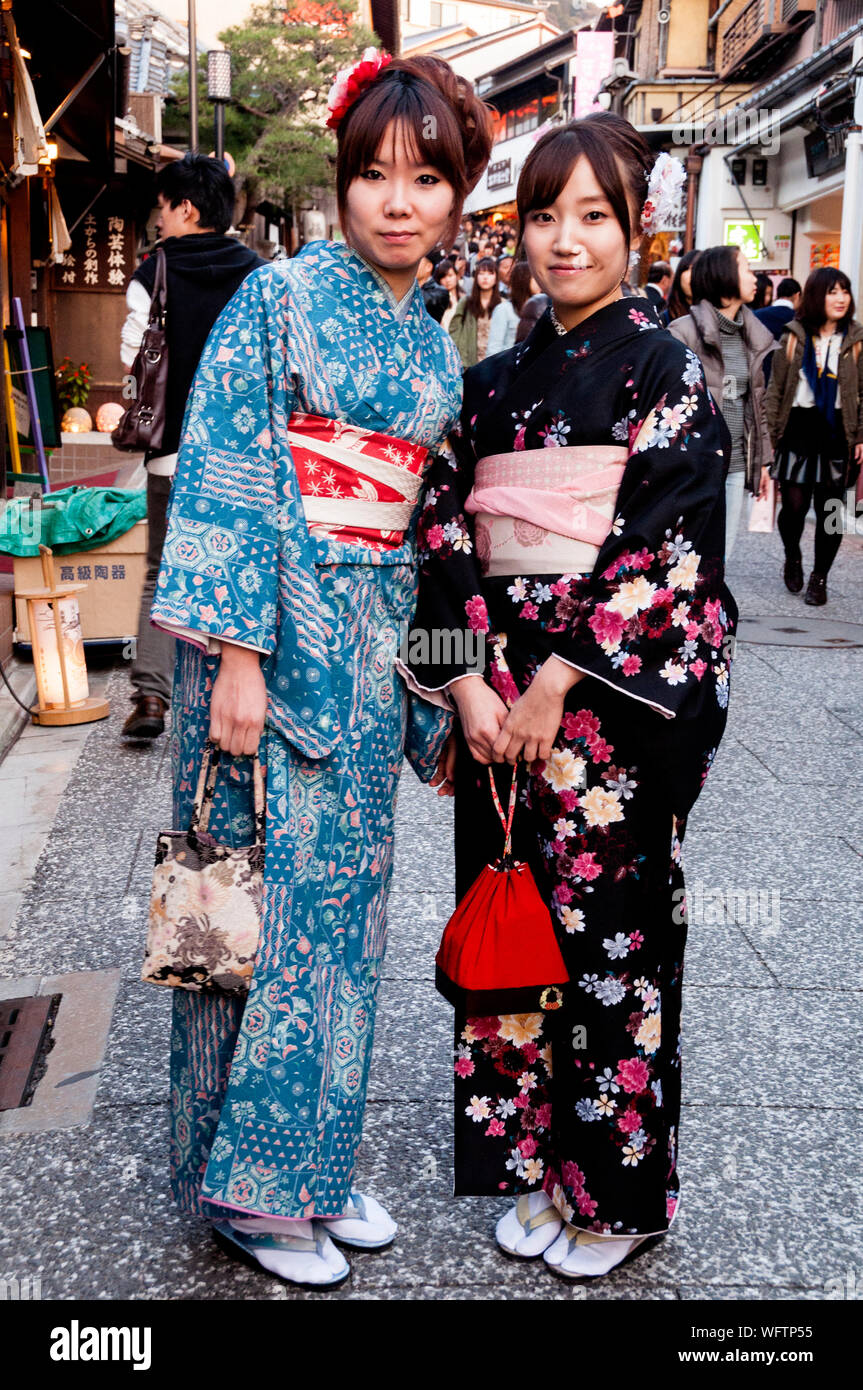 A visual splendor for any photographer, young Japanese women in traditional kimono fashions in Kyoto, Japan. Stock Photo