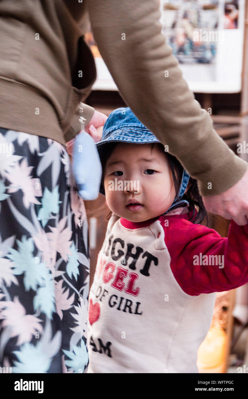 Sweet faced inquisitive look of a Japanese toddler at festival in Kyoto, Japan Stock Photo Alamy