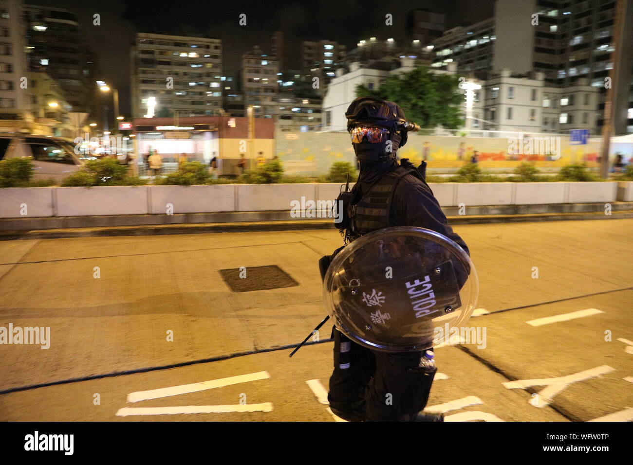 Hong Kong, China. 31st Aug, 2019. 31st August 2019. Hong Kong Anti Extradition Bill protests. After a day of many violent clashes with police angry residents surrounded Mong Kok Police Station to show their anger towards police actions that day Credit: David Coulson/Alamy Live News Stock Photo