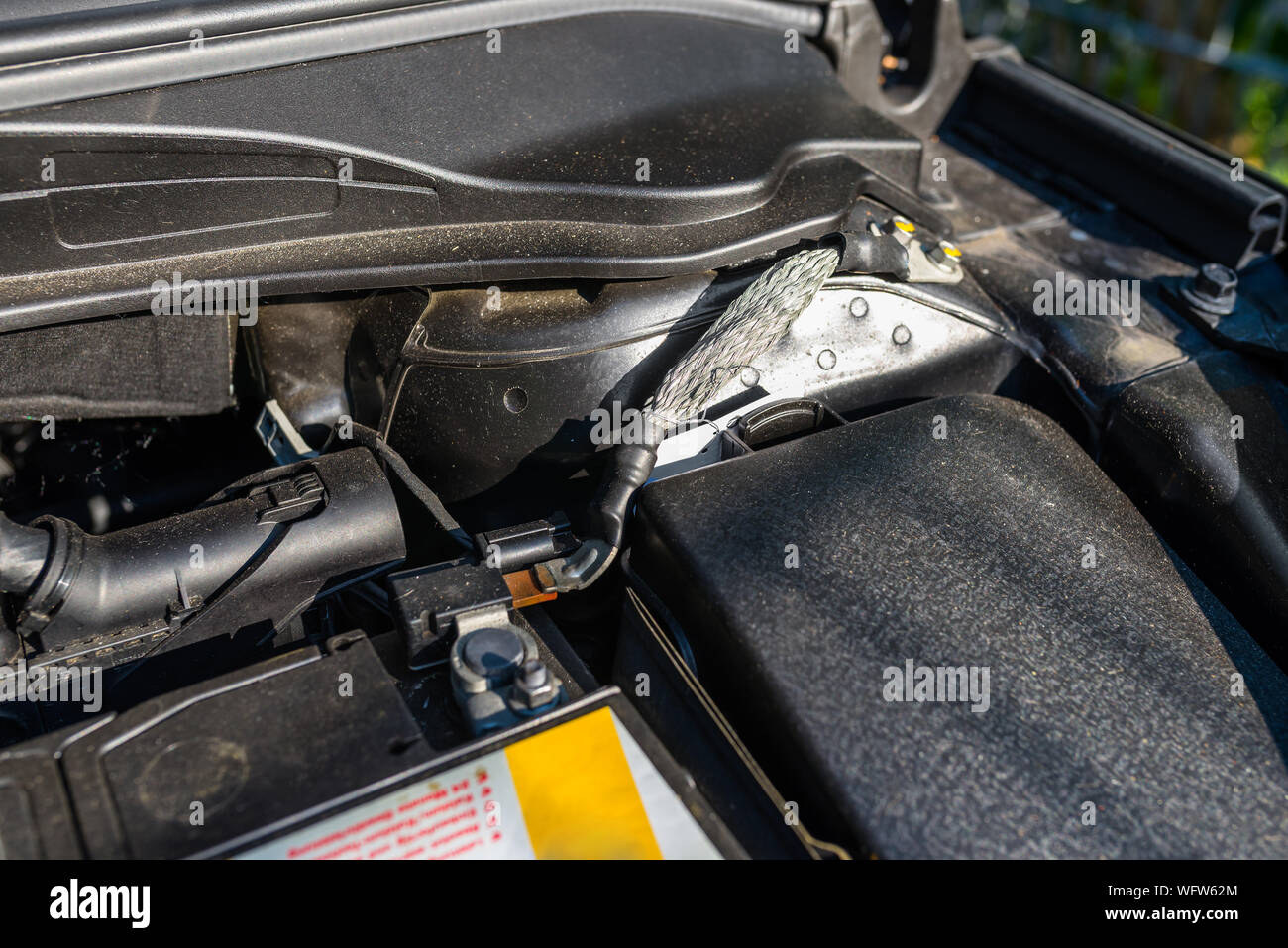 Ground cable connected to the cars body, minus cable Stock Photo Alamy
