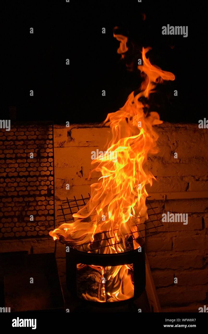 Blurred Motion Of Burning Fire Pit At Night Stock Photo