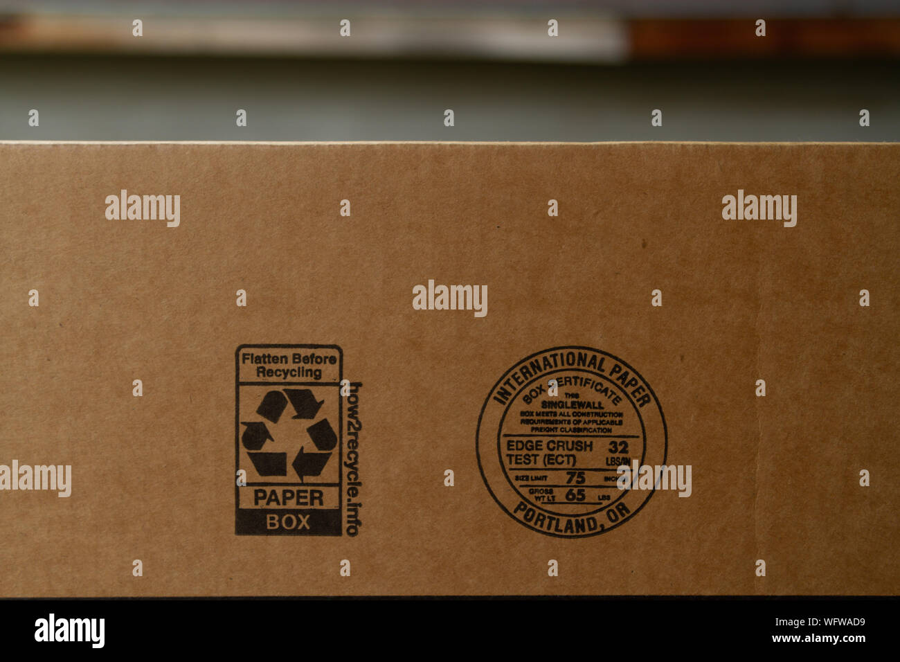 Recycling label and international paper box certificate stamp on an Amazon  Prime box Stock Photo - Alamy