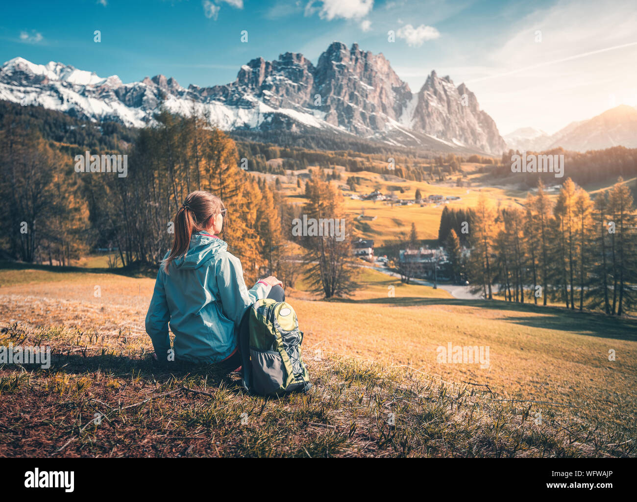 Girl sitting on high hill hi-res stock photography and images - Alamy