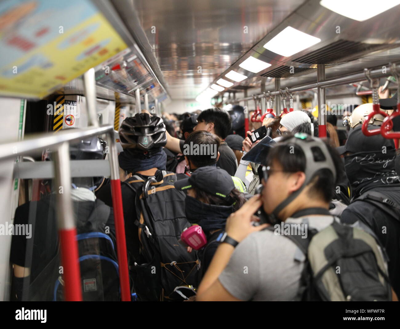 Hong Kong, China. 31st Aug, 2019. 31st August 2019. Hong Kong Anti Extradition Bill protests. After a day of many violent clashes with police. Some pro government supporters attacked a member of press on a MTR train with many pro democracy protesters who fought back. Credit: David Coulson/Alamy Live News Stock Photo