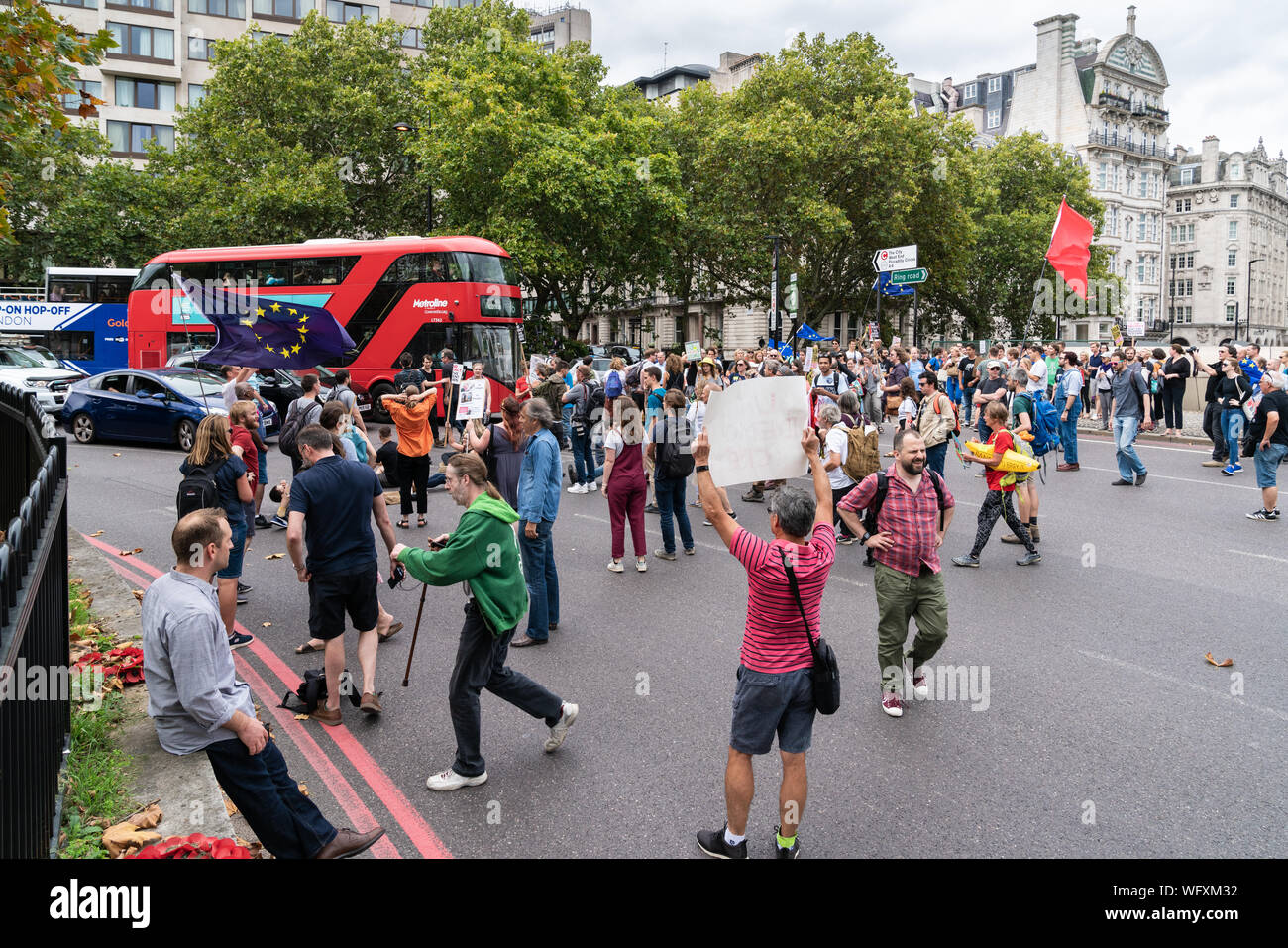 31th Aug 2019 - London, UK. An Anti-Brexit protesters witth placards and banners brought Hyde Park roundabout to a standstill. Stock Photo