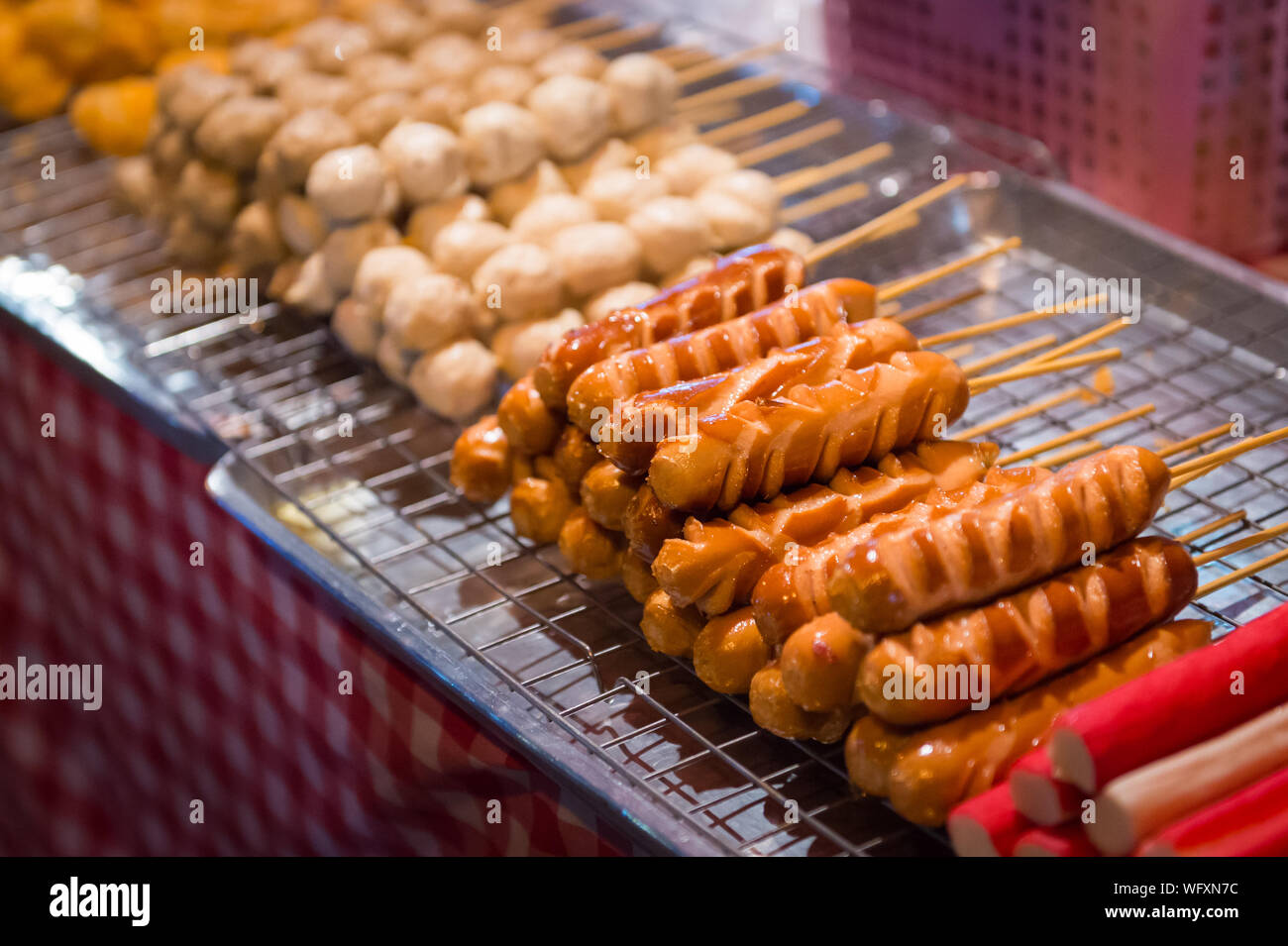 High Angle View Of Barbecued Sausages On Metal Grate Stock Photo