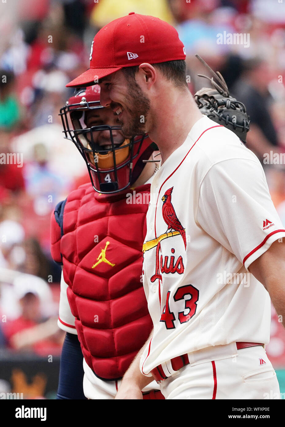 St. Louis Cardinals starting pitcher Dakota Hudson and catcher Yadier Molina smile as they leave the field after the third out of the seventh inning against the Cincinnati Reds at Busch Stadium in St. Louis on Saturday, August 31, 2019. St. Louis defeated Cincinnati 10-6.   Photo by Bill Greenblatt/UPI Stock Photo