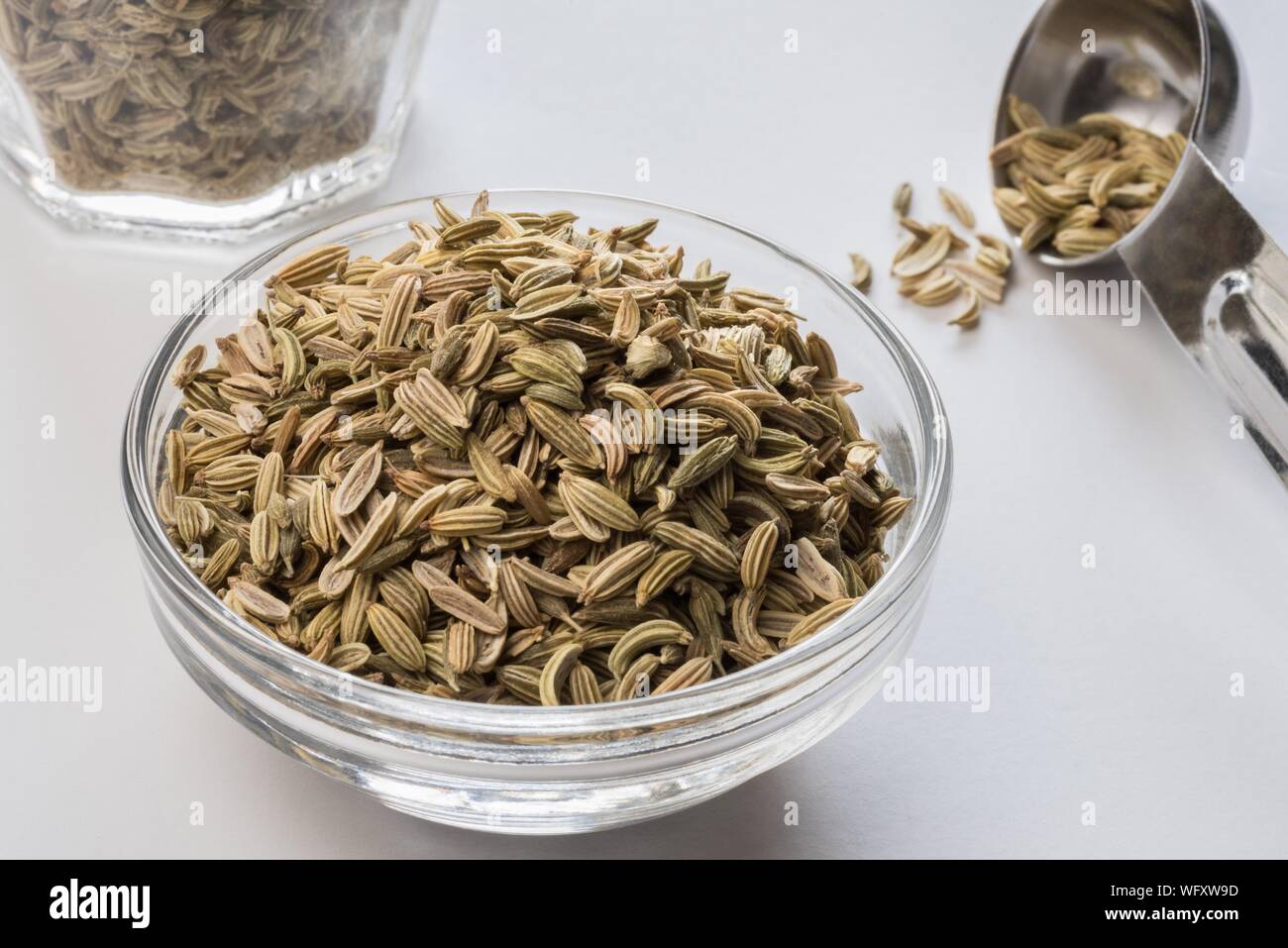 High Angle View Of Fennel Seeds In Bowl On White Table Stock Photo