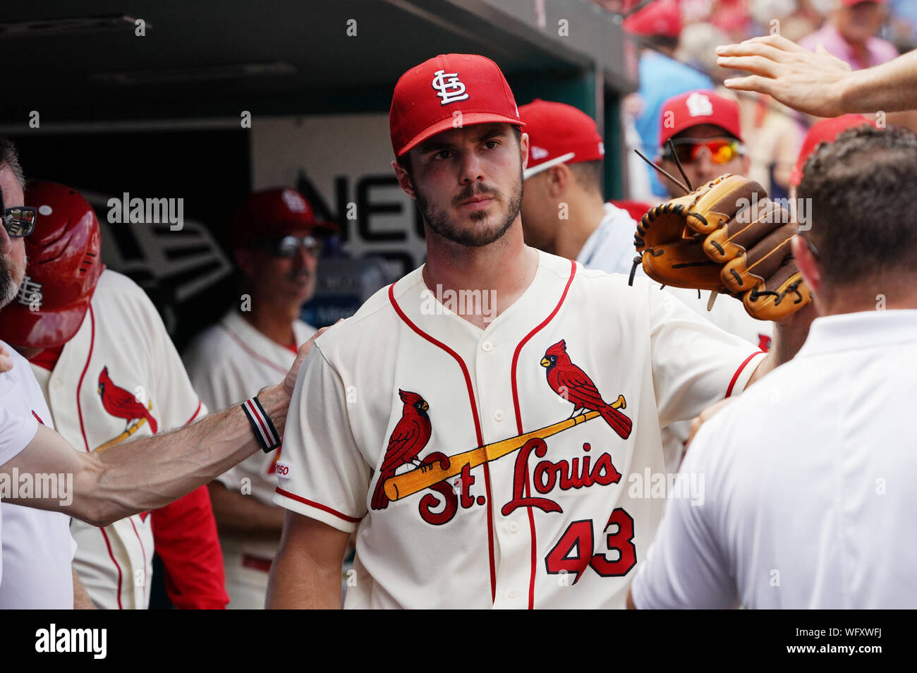 St. Louis Cardinals starting pitcher Dakota Hudson is congratulated in the dugout after coming out of the game in the seventh inning against the Cincinnati Reds at Busch Stadium in St. Louis on Saturday, August 31, 2019. St. Louis defeated Cincinnati 10-6.   Photo by Bill Greenblatt/UPI Stock Photo