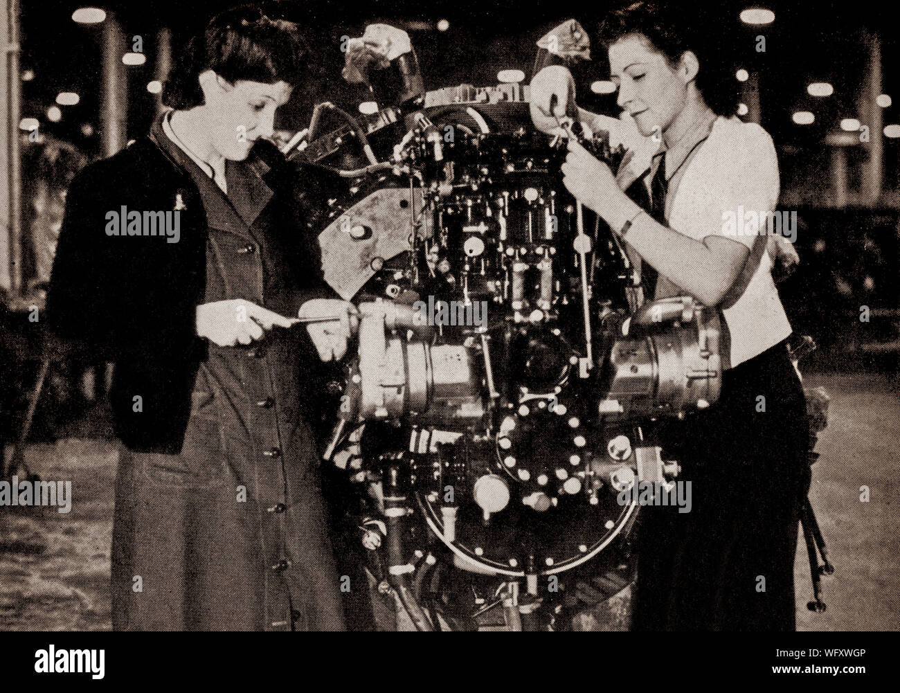 A Bristol Hercules engine undergoing inspection before going to the test bench for preliminery running trials. The 14-cylinder two-row radial aircraft engine designed by Sir Roy Fedden and produced by the Bristol Engine Company starting in 1939. It was the first of their single sleeve valve (Burt-McCollum, or Argyll, type) designs to see widespread use, powering many aircraft in the mid-World War II timeframe. Stock Photo