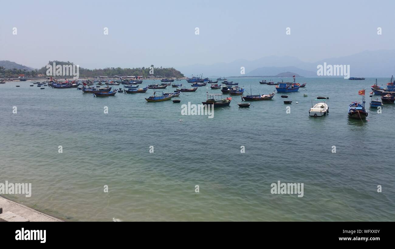 Boats Moored In Sea Against Clear Sky Stock Photo