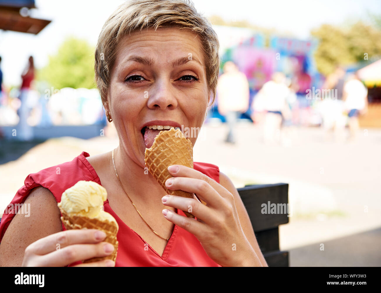 Portrait Of Woman Licking Ice Cream Stock Photo Alamy