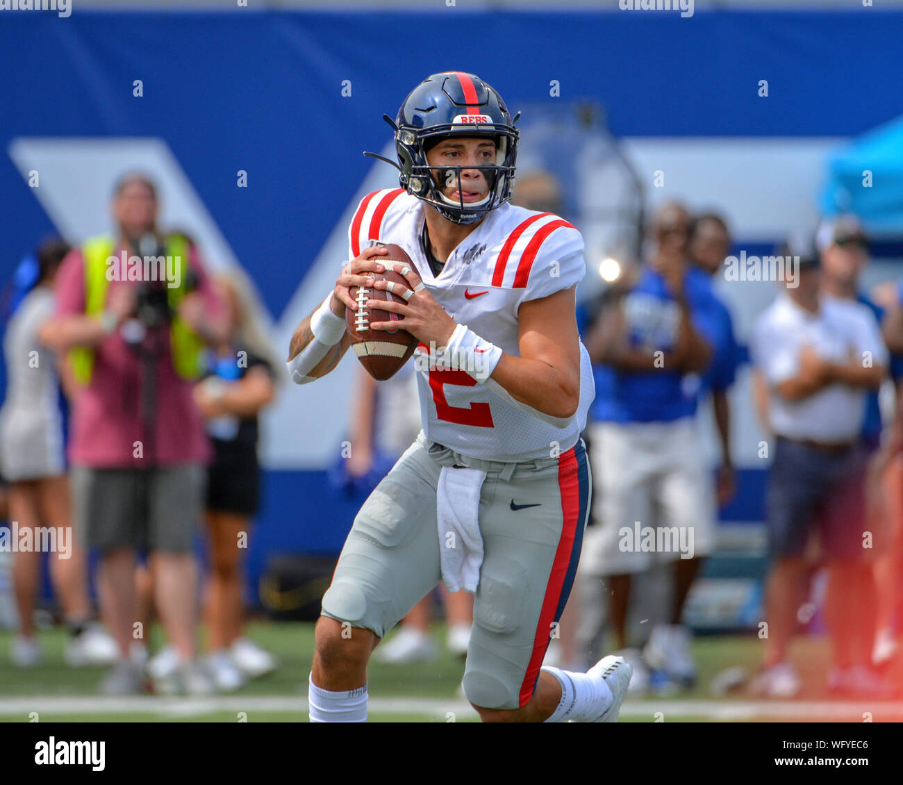 August 31, 2019: Ole' Miss quarterback, Matt Corral (2), rolls out looking  for a receiver during the NCAA football game between the Ole' Miss Rebels  and the Memphis Tigers at Liberty Bowl