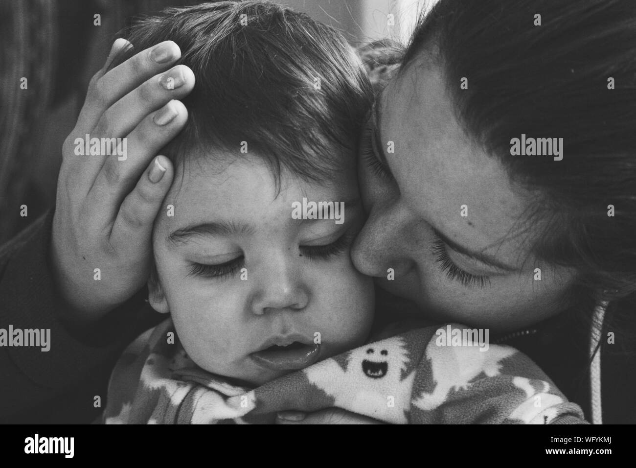 Closeup Of Mother Kissing Baby Boy Stock Photo Alamy