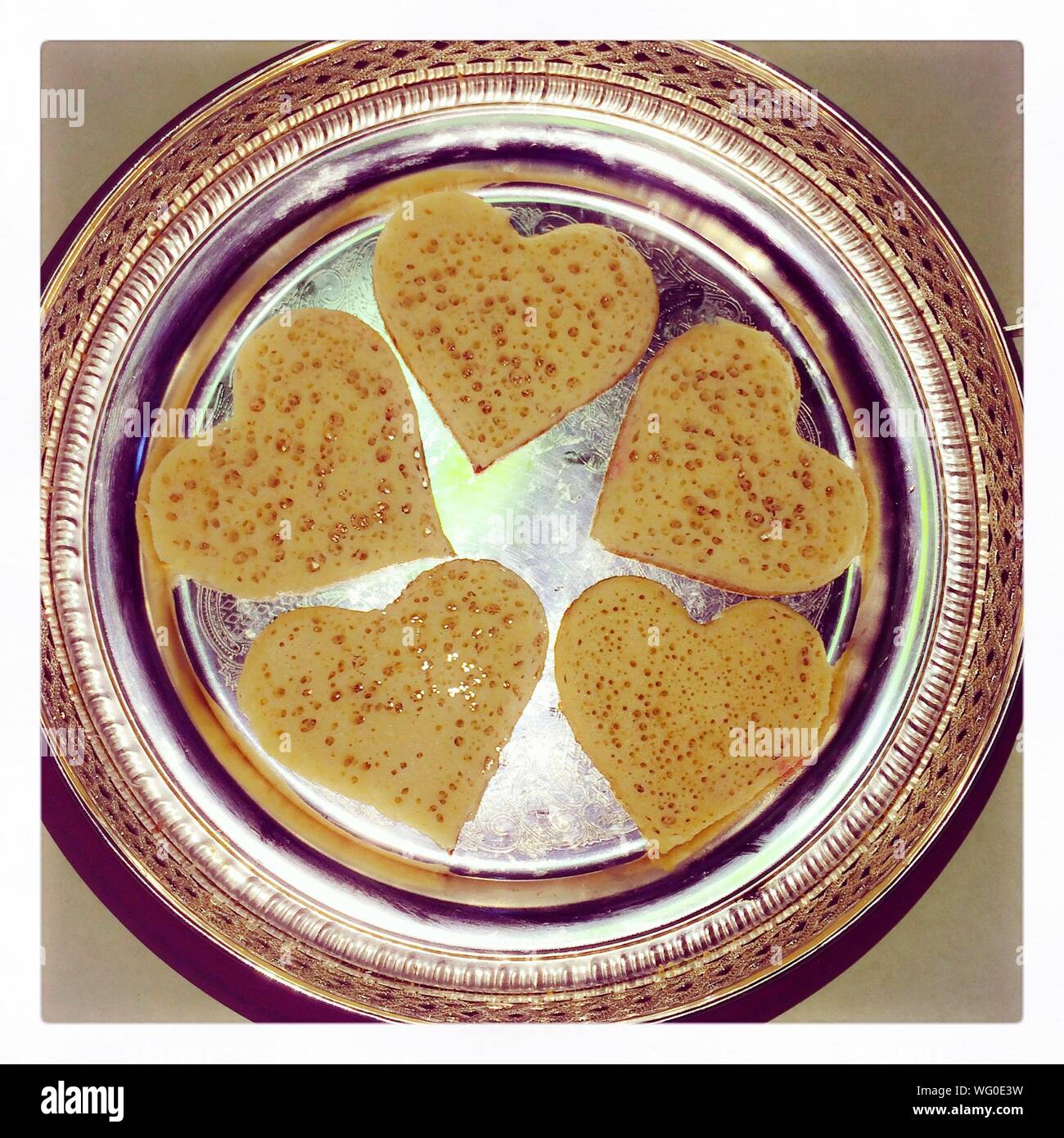 Directly Above Shot Of Serving Heart Shaped Pancakes In Plate Stock Photo