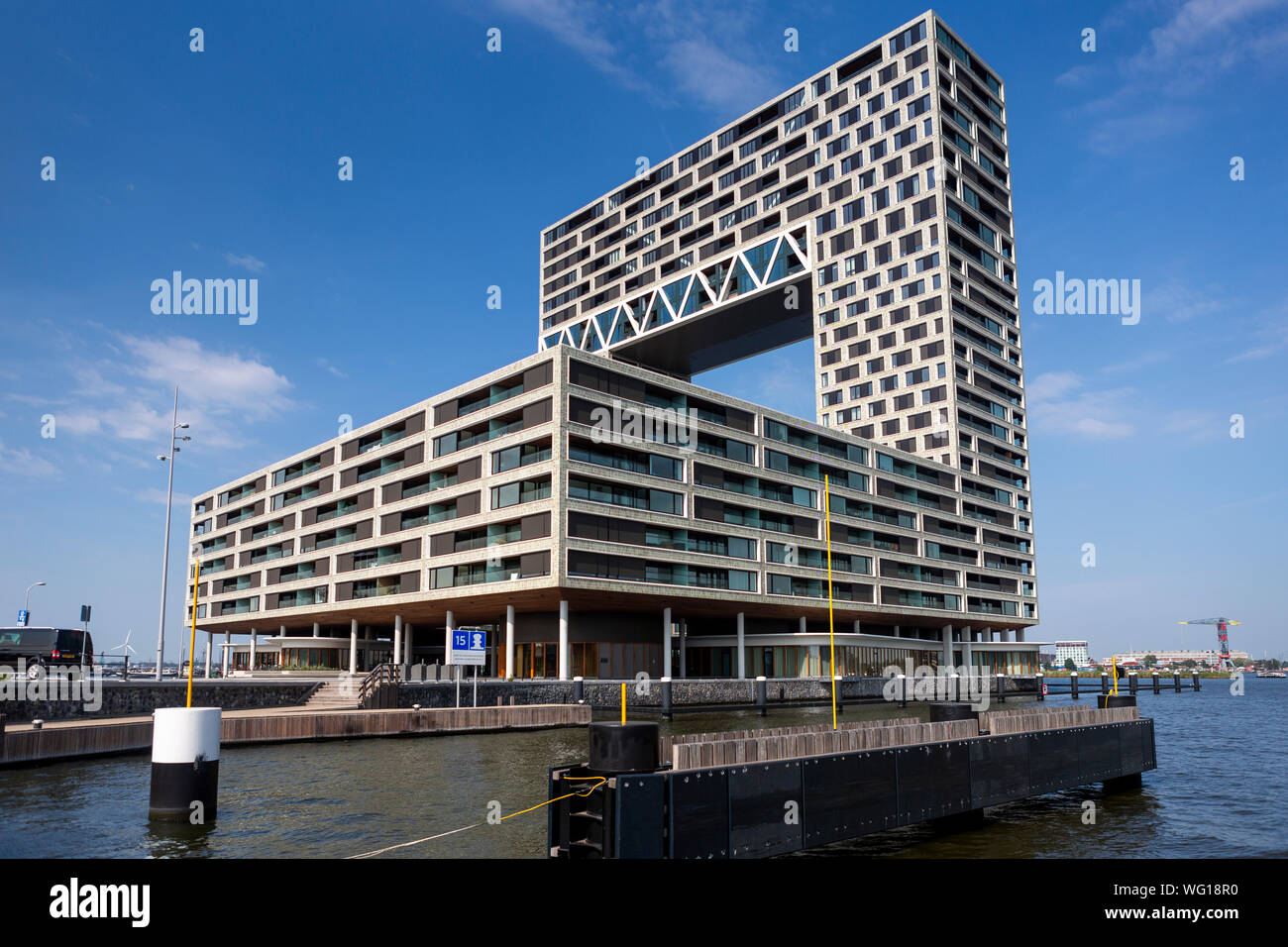 Modern apartment building in the contemporary housing project in the Houthaven neighbourhood and ferry  departure to NDSM port area Stock Photo