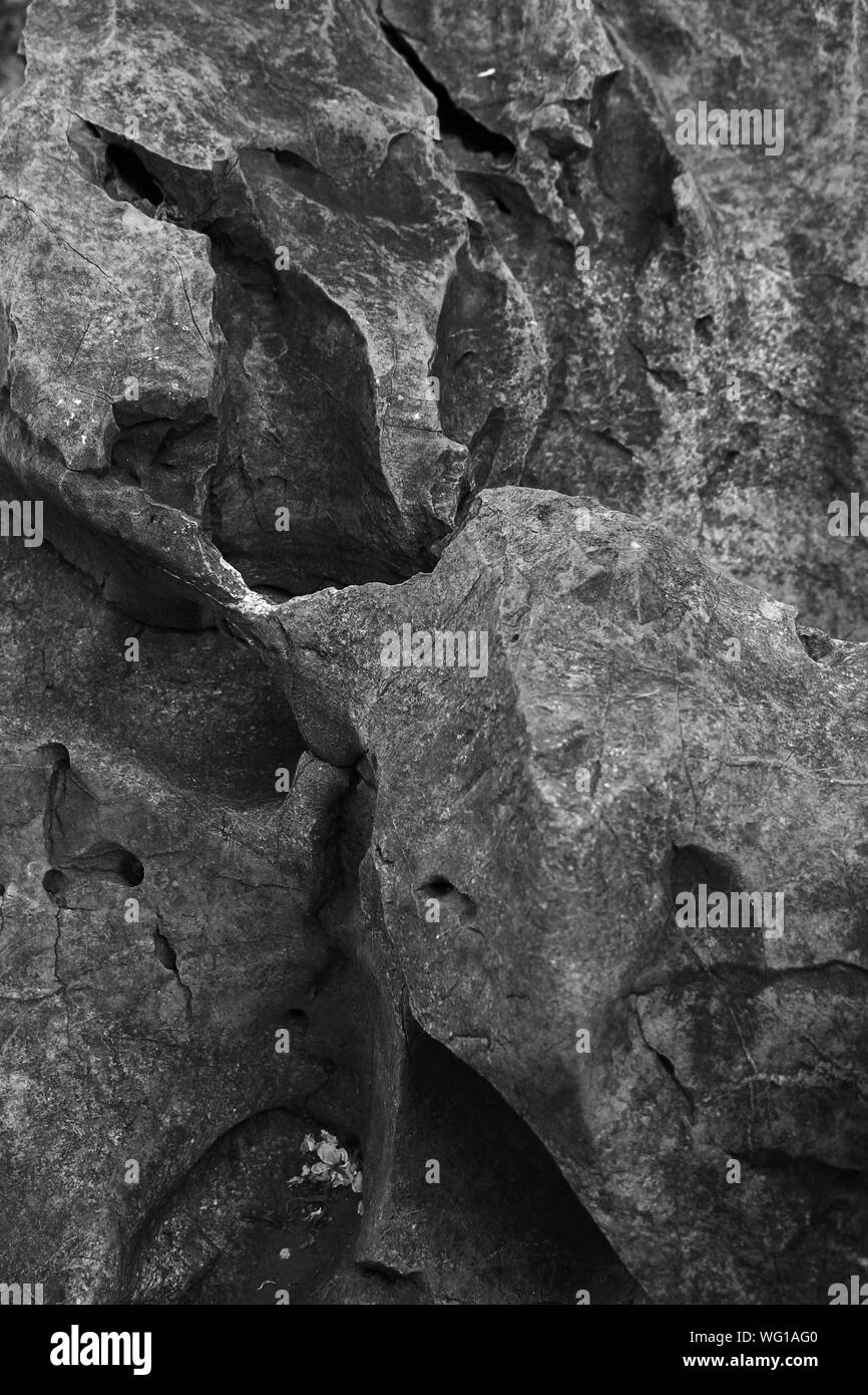 Black and white photo of a strangely shaped rock expression Stock Photo