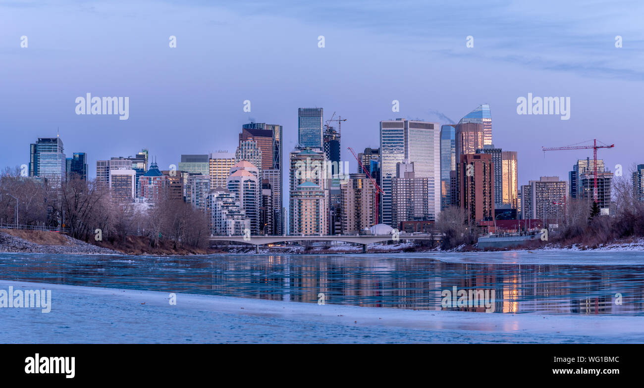 Calgary's skyline along the Bow River during the winter Stock Photo - Alamy