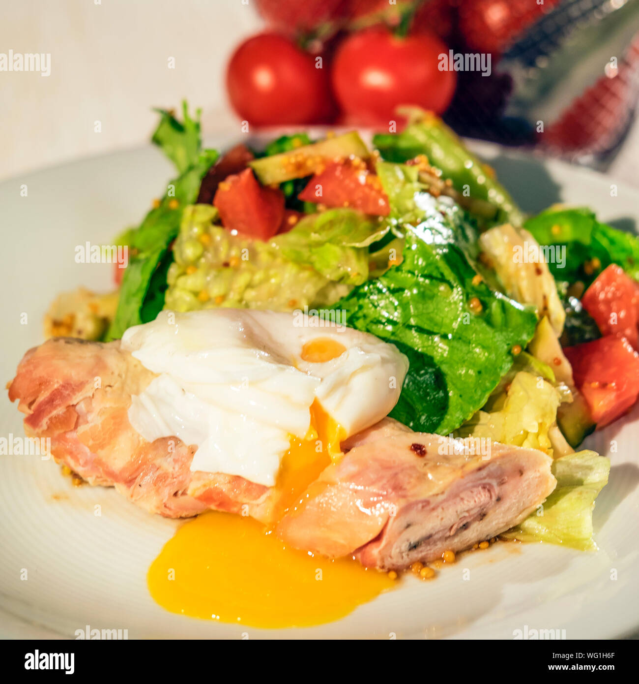 Close-up Of Salad With Poached Egg In Plate Stock Photo