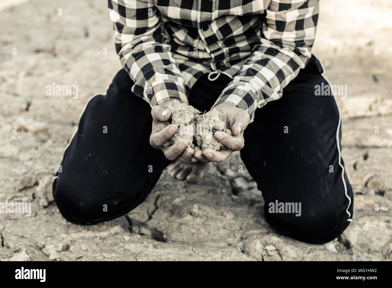 Woman kneeling hands up hi-res stock photography and images - Alamy