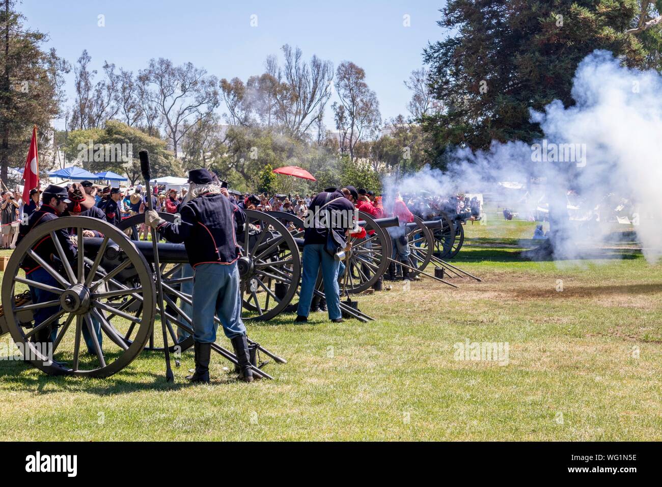 Union soldiers firing cannons during a Civil War reenactment Stock Photo
