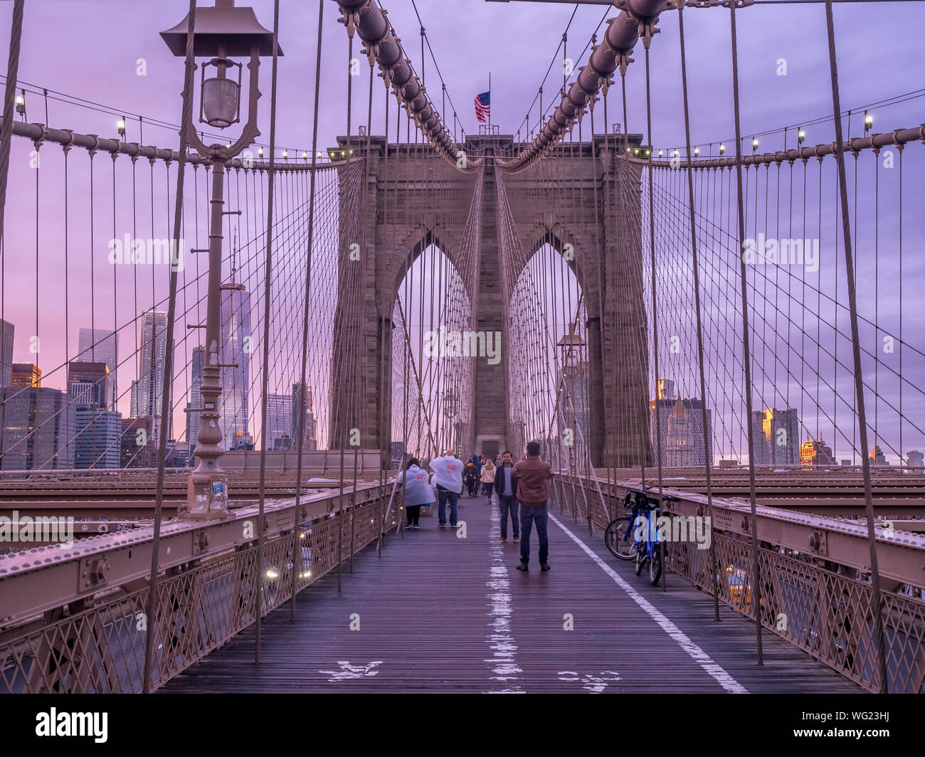 The famous Brooklyn Bridge at sunset in New York City. The Brooklyn ...