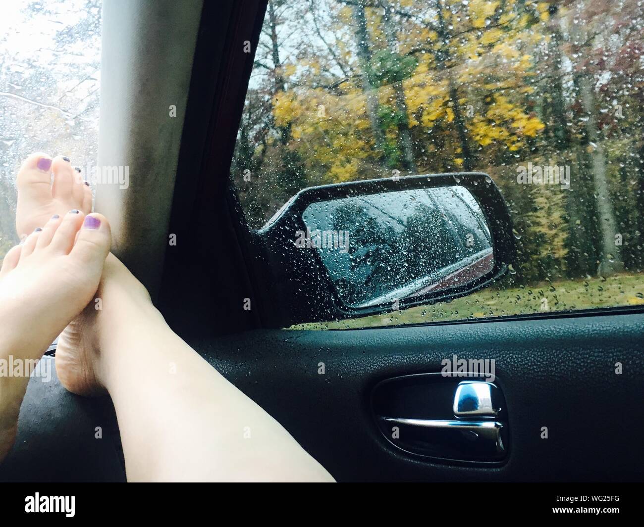 Feet on dashboard car on hires stock photography and images Alamy