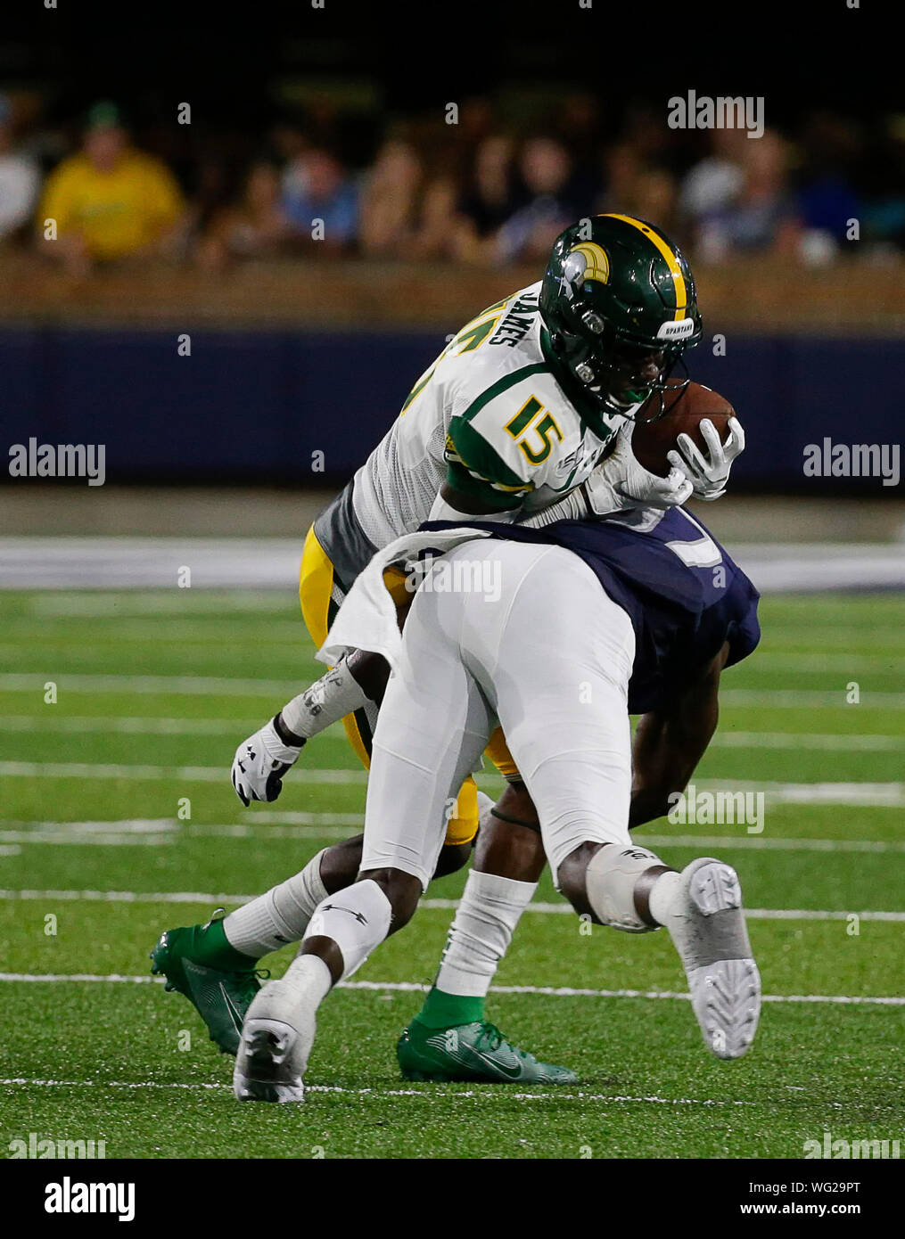 August 31, 2019: Norfolk State Spartans WR #15 Da'Kendall James is hit by ODU Monarchs WR #17 John Johnson after catching the ball during a NCAA football game between the Old Dominions Monarchs and the Norfolk State Spartans at S.B. Ballard Stadium in Norfolk, VA. Justin Cooper/CSM Stock Photo