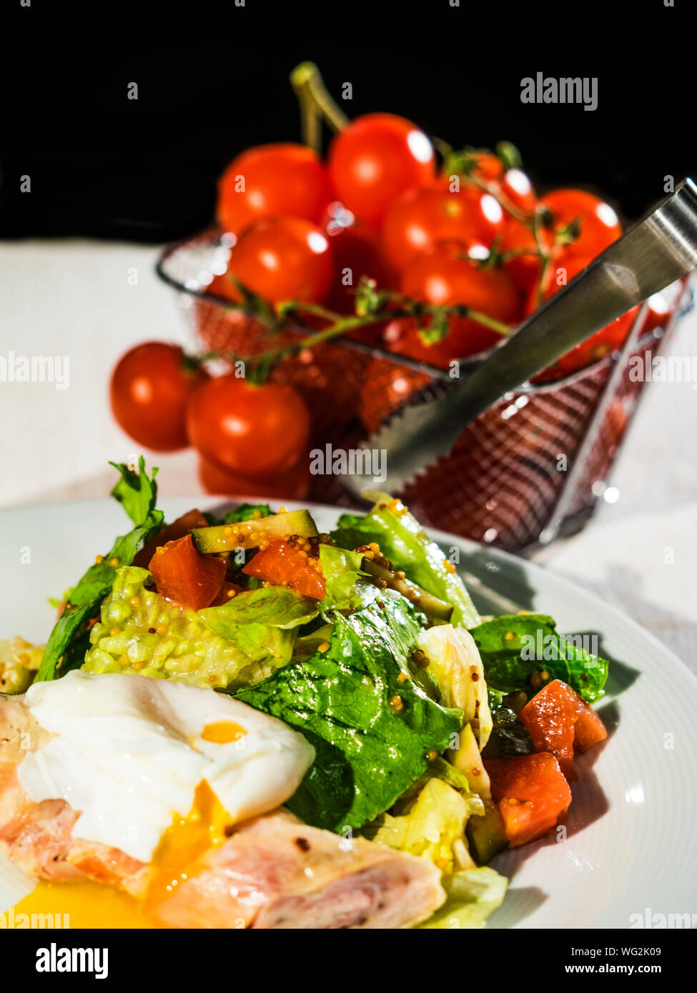 Close-up Of Fresh Salad And Poached Egg In Plate Stock Photo
