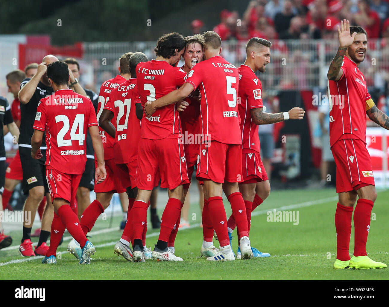 Berlin, Germany. 31st Aug, 2019. Marius Buelter (4th R) of Union Berlin celebrates his scoring with teammates during a German Bundesliga match between 1.FC Union Berlin and Borussia Dortmund in Berlin, capital of Germany, on Aug. 31, 2019. Credit: Shan Yuqi/Xinhua/Alamy Live News Stock Photo