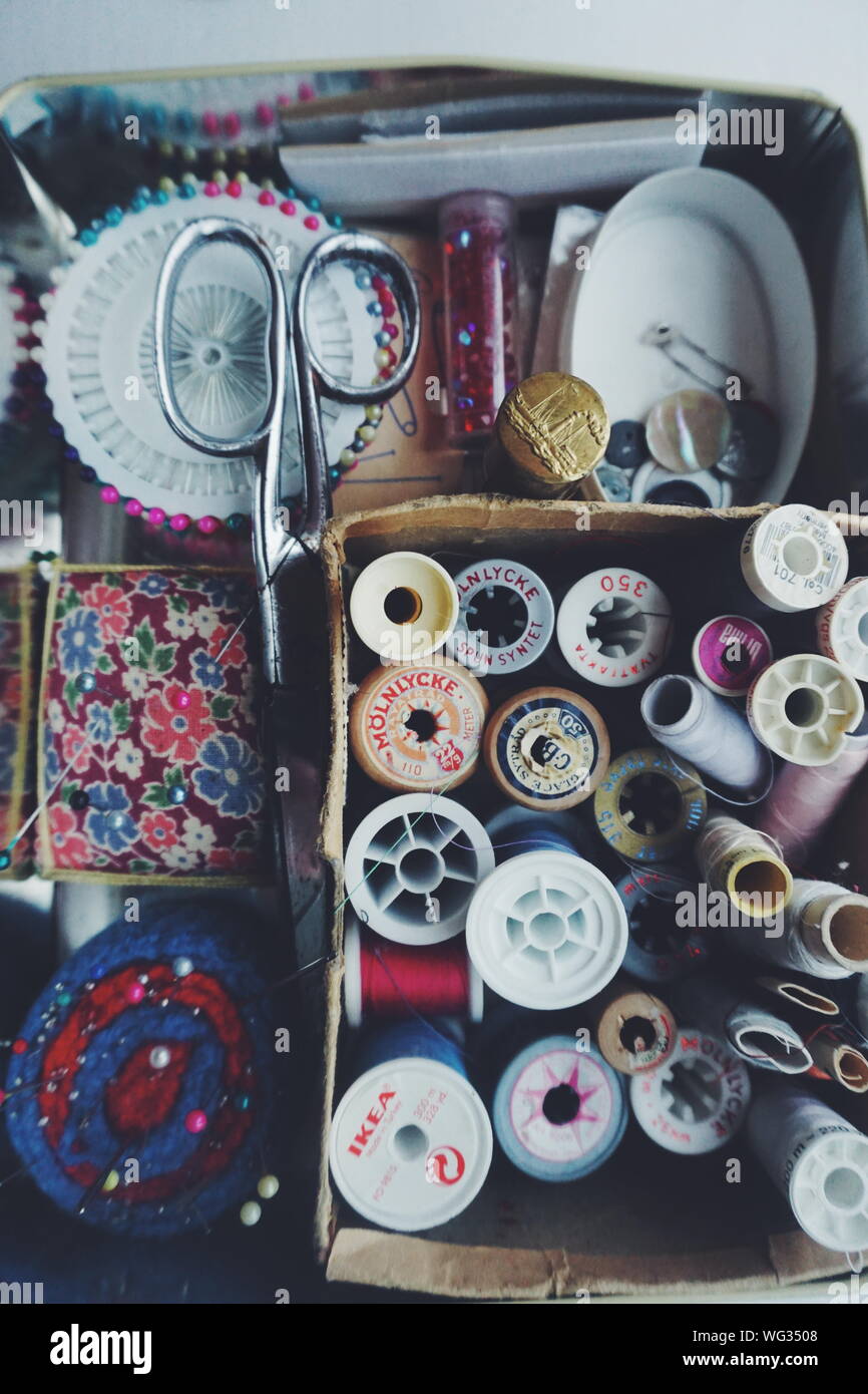 Directly Above Shot Of Sewing Items In Box Stock Photo