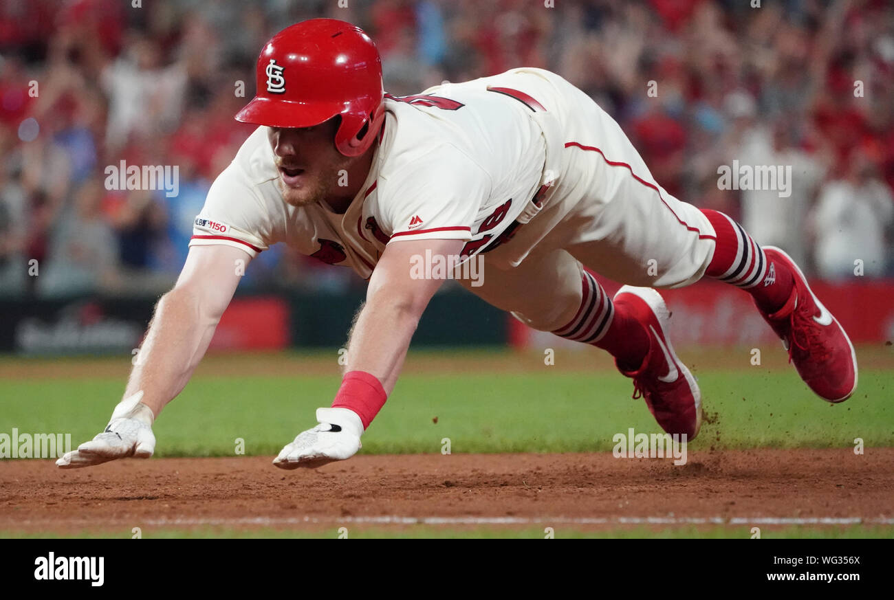 St. Louis Cardinals Harrison Bader dives back into first base after hitting a game tying single in the ninth inning against the Cincinnati Reds in game two of their double header at Busch Stadium in St. Louis on Saturday, August 31, 2019. St. Louis defeated Cincinnati 3-2.  Photo by Bill Greenblatt/UPI Stock Photo