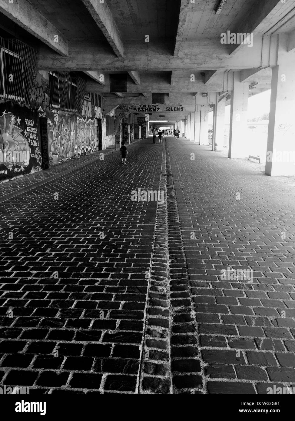 Boy Walking In Underground Walkway Stock Photo Alamy